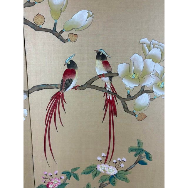 A serene and beautifully rendered Asian decorative panel featuring magnolia blossoms, long‑tailed birds, and a drifting...