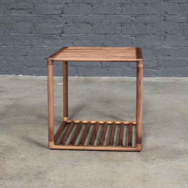 Porada Solid walnut Canaletto accent table available from showroom display. (Tray not included.) DIMENSIONS — width: 18”...