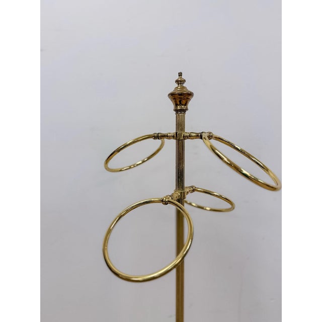 This elegant vintage brass Regency style freestanding towel and scarf rack is a refined and practical bathroom, dressing...