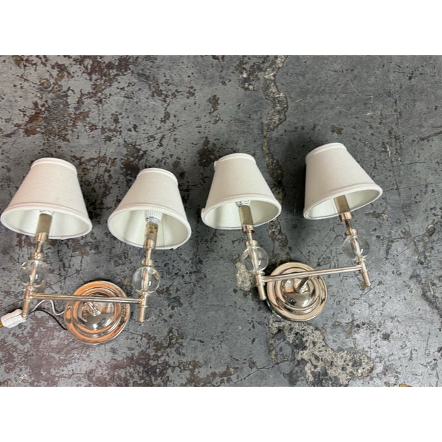 Design Plus Gallery presents a Pair of Wilshire Sconces from Restoration Hardware. This matching set showcases a balanced...