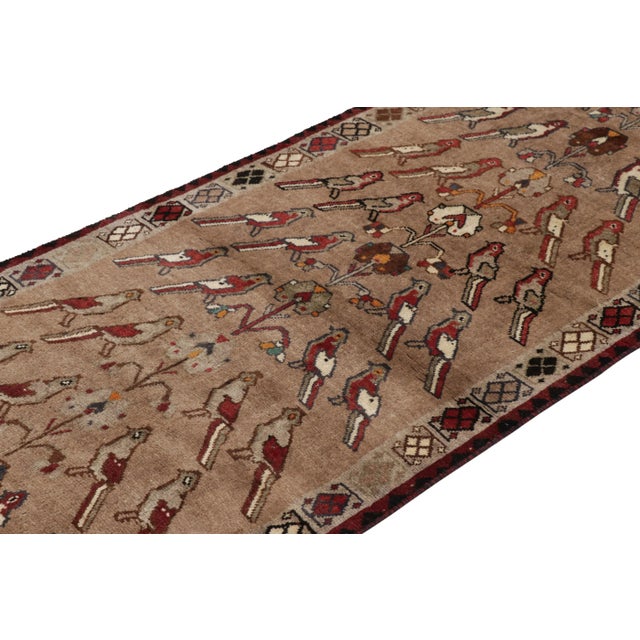 This vintage 3x9 Persian Gabbeh runner rug is the latest entry to Rug & Kilim’s curation of rare tribal pieces. Hand-...