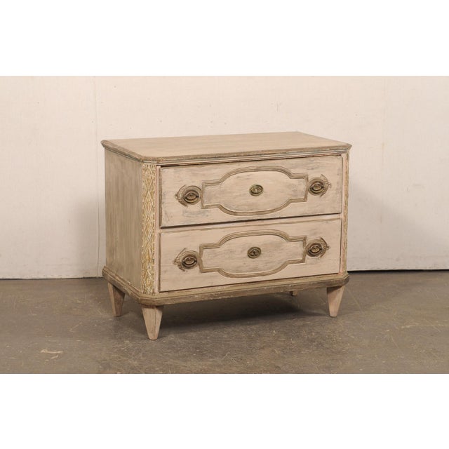 A charming Swedish Provincial Gustavian period two-drawer chest from the first half of the 19th century. This antique...