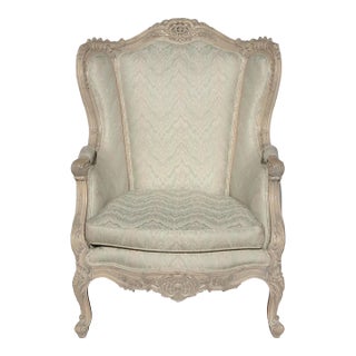Vintage French Louis XV Wingback With Carved Ornate Figural Frame For Sale