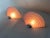 A striking pair of vintage wall sconces dating from the 1980s, featuring spectacular fan-shaped diffusers made of thick,...