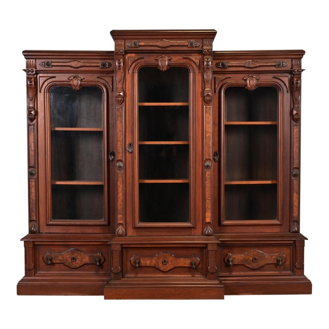 Herter Brothers Style Antique Eastlake Victorian Carved Walnut and Burl Wood Triple Bookcase Cabinet, Circa 1880s For Sale