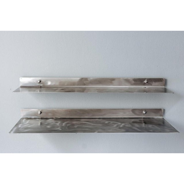 Bent ultron xm large wall shelf in brushed stainless steel by form & eisen dimensions: d 20 x l 100 cm. Materials: brushed...