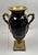 Large black ceramic vase, neoclassical style with gilt bronze handles, late 19th century. An elegant baluster-shaped vase...