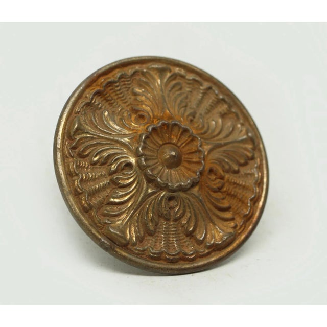 Five fold design flat brass drawer pull. Inscribed Spain on the backside. Good condition with surface wear from prior use....