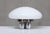 This rare table lamp was designed by Sergio Mazza and Giuliana Gramigna in 1973. The model is called Magnolia, produced by...