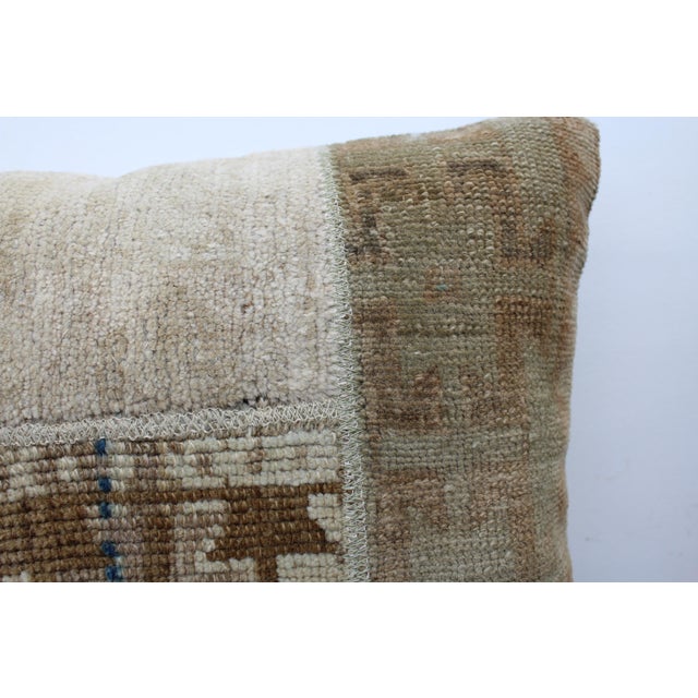 This Turkish pillow cover is made from the highest quality vintage rug in 100% wool on the front. The back is covered in...