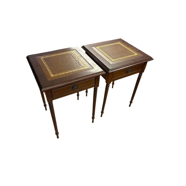 Classic English-style pedestal desk with leather top, sold together with matching side tables. Elegant and functional set...