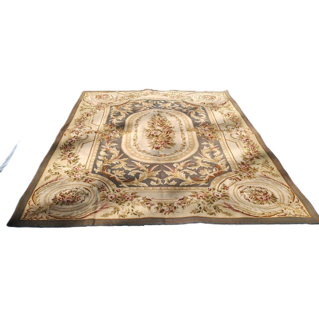 A hand-woven rug made using traditional French Aubusson dyeing and weaving methods. This hand-woven, flat-weave Aubusson...
