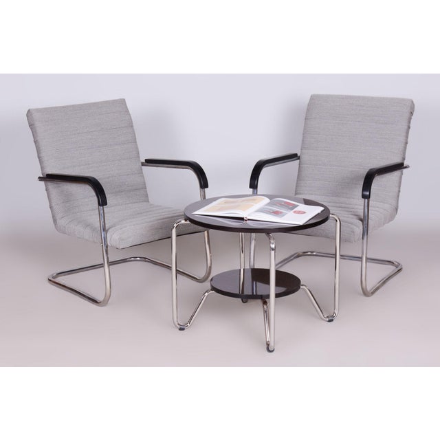 Made by Mücke Melder, an influential modernist furniture manufacturer specializing in tubular steel designs. According to...