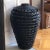 Offering a tall urn-style rattan floor vase with stunning black lacquer finish. The wide and intricately handwoven fibers...