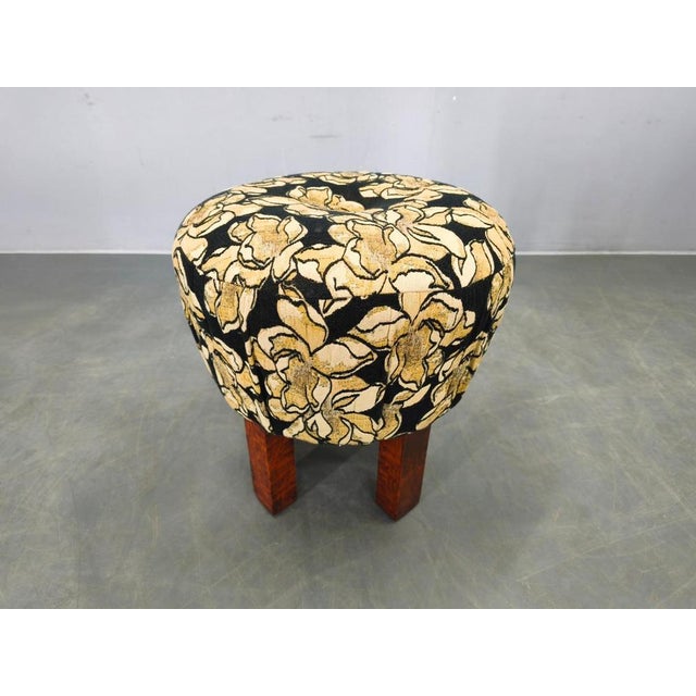 Elegant Art Deco round stool produced in Czechoslovakia during the 1930s. This compact tabouret features a sculptural...