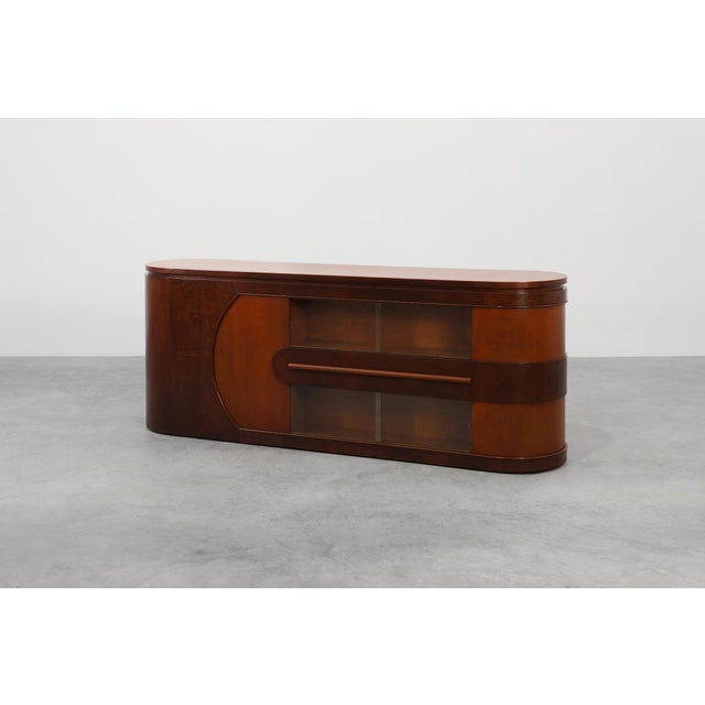 A very rare matched pair of 1920s Art Deco counters by the renowned Belgian firm De Coene, these pieces exemplify the...