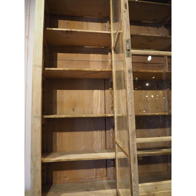 French A Grand French Antique Scaped Pine Bibliotheque Vitrine Deux Corps, Circa 1900 For Sale - Image 3 of 18