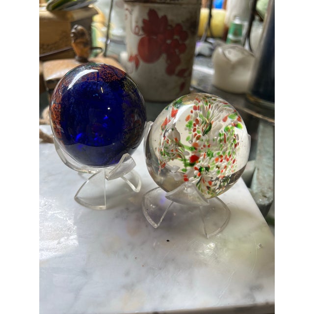 Up for consideration is a beautiful vintage pair of glass colorful paper weights. These would look lovely in your office...