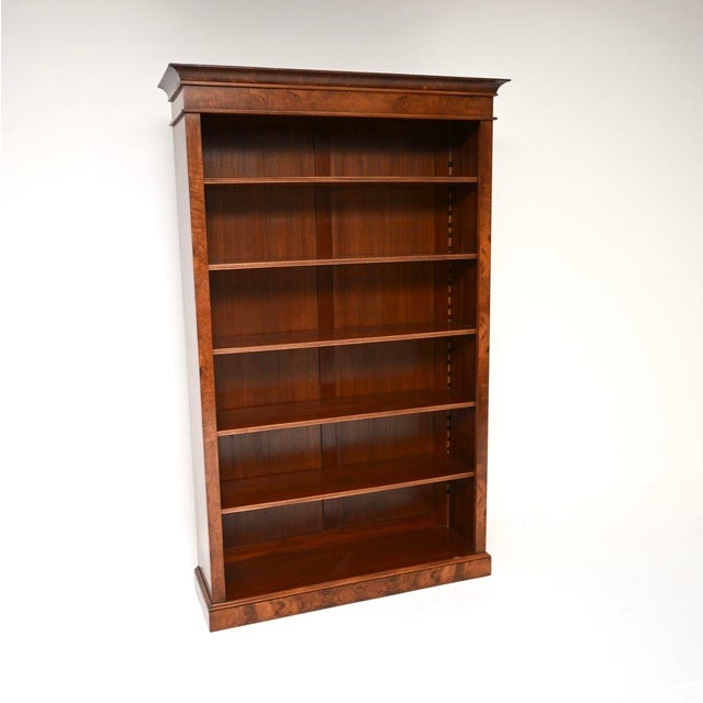 A beautiful and extremely well made antique Victorian style walnut open bookcase. This was made in England, it dates from...