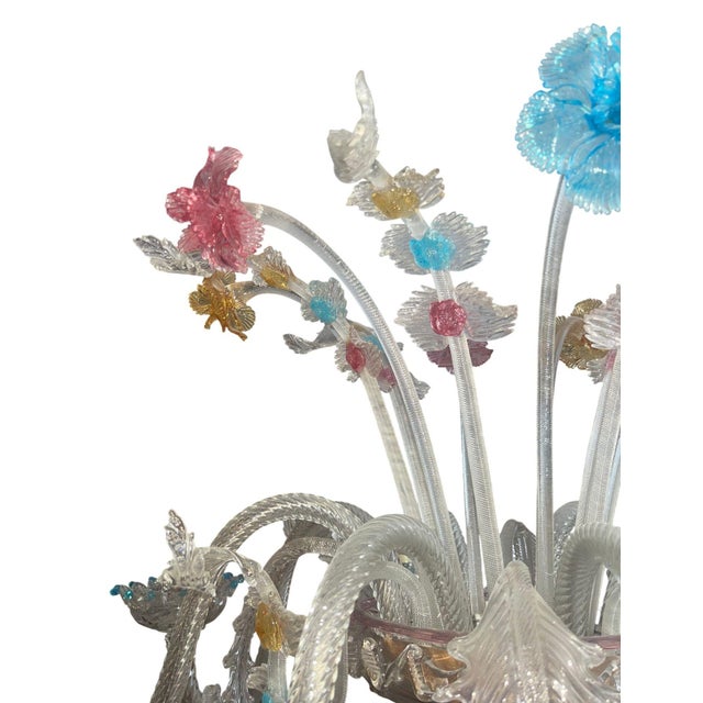 An exceptional Italian Murano glass floor lamp from the 1950's, richly adorned with hand-blown multicolored floral...