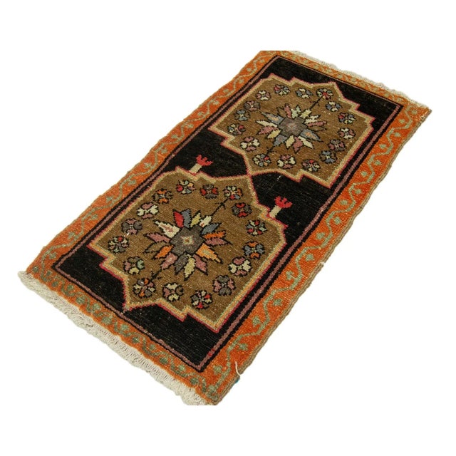 Vintage Handknotted decorative mini rug from Kars region of Turkey. Approximately 45-55 years old. In very good condition.