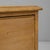 19th Century English Wooden Chest of Drawers. This charming English chest from the 19th century features a warm, natural...