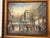 This lovely oil painting on canvas is a late 20th century vintage Paris Street scene with a beautiful heavy wood gilded...