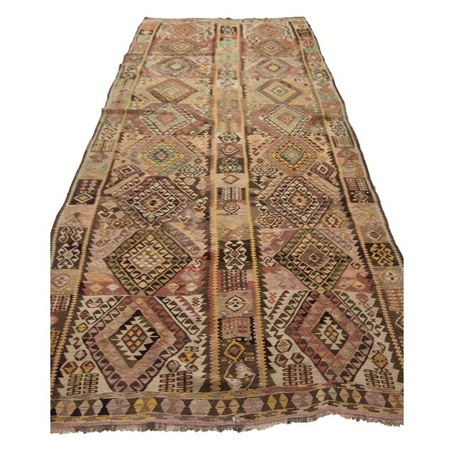 Vintage handwoven kilim rug from Kars region of Turkey. Approximately 55-65 years old. In very good condition.