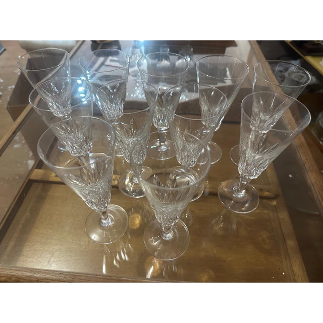 Carcassonne Champagne Flutes from Baccarat, Set of 12, in Flawless conditions. Designed 1970 to 1979 This piece has an...