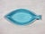 This item is a lovely classic Mid-Century design original in a beautiful turquoise color. Unique and playful conversation...