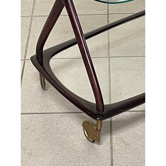 Refined 1950s serving trolley, attributed to renowned designer and set designer Cesare Lacca. An iconic piece of mid-...