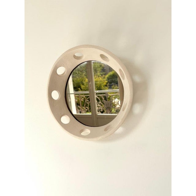 Tondo Handmade Ceramic Mirror by Renzo Maar Handmade Dimensions: D 26 x H 10 cm (dimensions are approximate) Materials:...