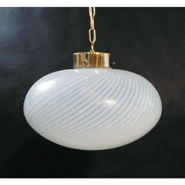 Vintage Italian pendant with a single large translucent frosted Murano glass shade hand blown with bubbles inside the...