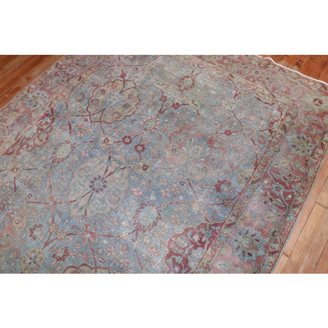 a late 19th Century Persian Yazd rug in blue and raspberry Details rug no. j2681 size 5' 11" x 8' 9" (180 x 267 cm) Yazd...