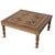 Vintage square Indian teak wood coffee table. Showcases intricate hand-laid inlay work across the top, apron, and turned...