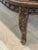 Timeless European elegance meets everyday versatility. This beautifully carved vintage cane bench showcases exceptional...