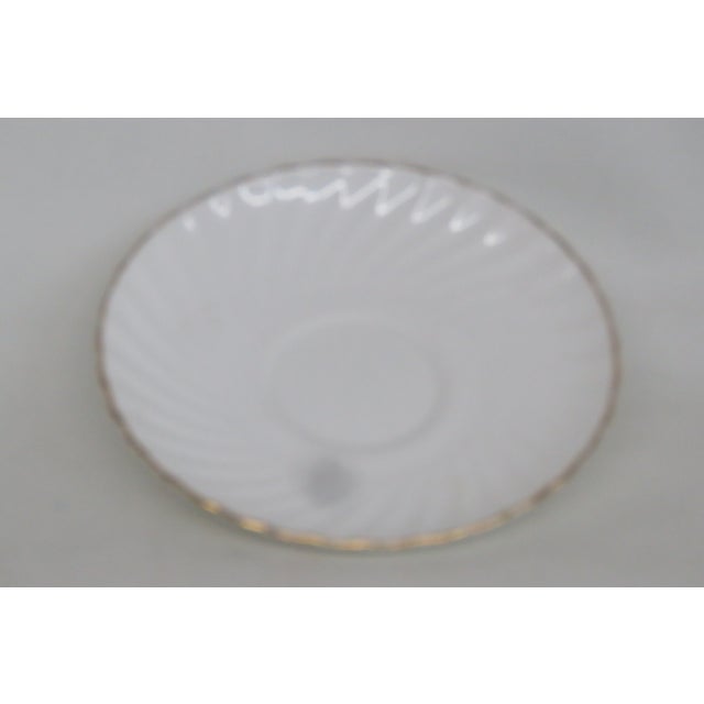 This lovely saucer is made of fine bone china, and it is stamped as being made by Adderley in England, see pictures. This...