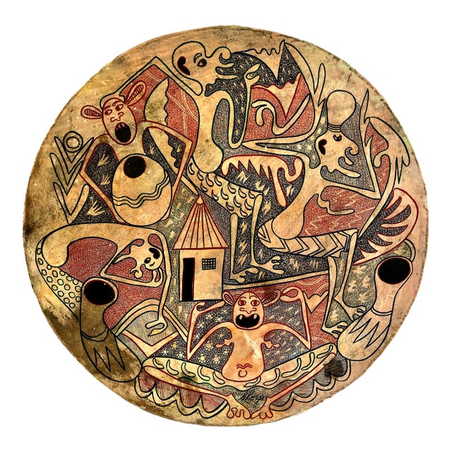 Tanzanian Spirits on a Painted and Carved Circular Wood Relief, Signed by George Lilanga For Sale