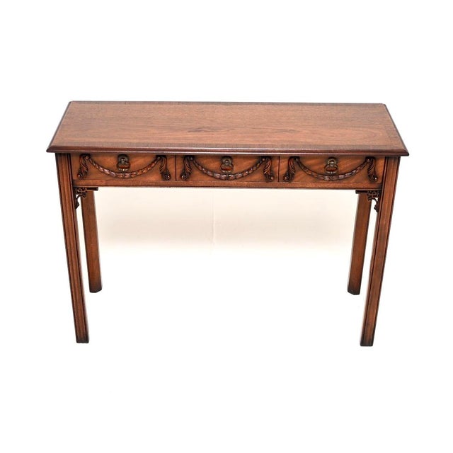 A beautiful antique Georgian style console table. This was made in England, we would date it to around the 1930-50’s...