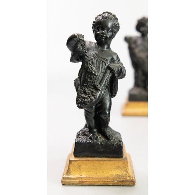 A charming set of two Italian cherubs or putti figurines by Borghese, circa 1930. Maker's label on the base of one. These...