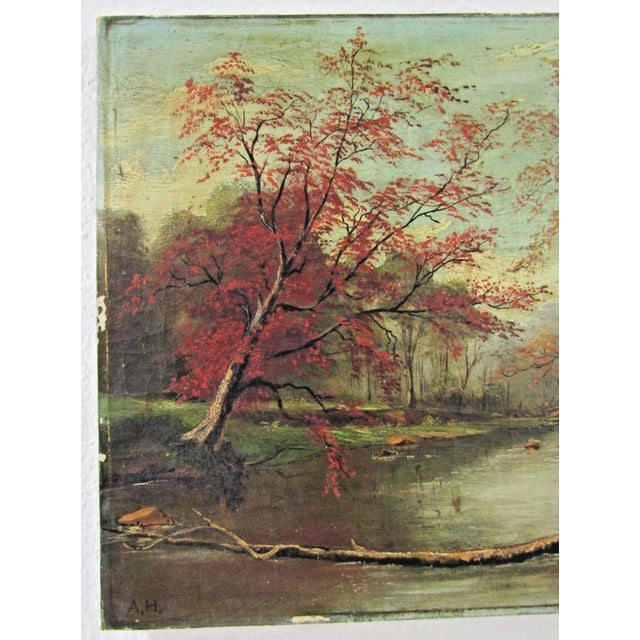 This 19th century antique Hudson River School signed autumn scene oil painting by artist A. H. captures the essence of...