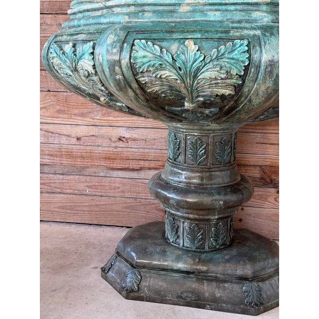 A striking Mid-20th Century two-piece Neoclassical Revival fountain, beautifully detailed and finished in a verdigris...