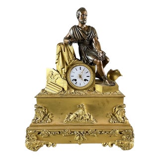 Early 19th Century Empire Clock in Gilt and Patinated Bronze For Sale