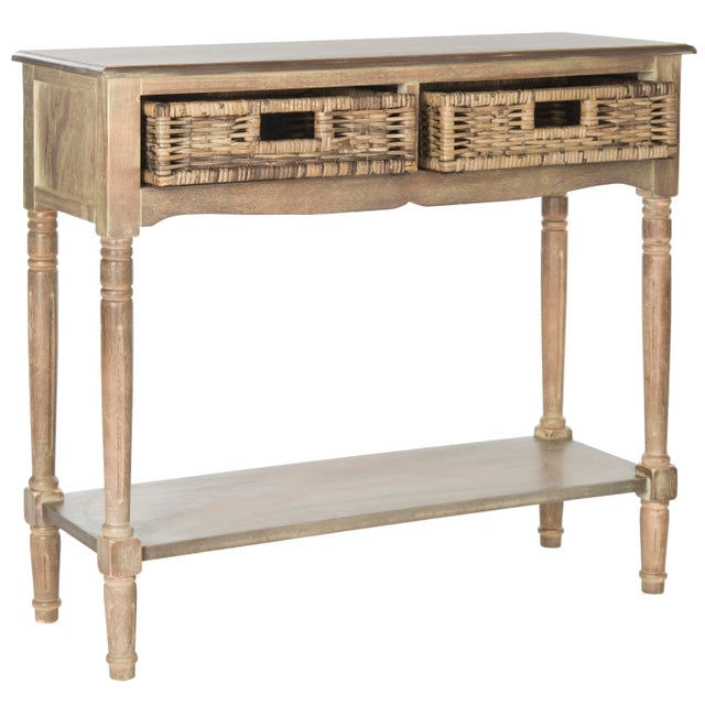 British Colonial styling is updated in the pretty and practical Corbin console with woven rattan pull out drawers. Pine in...