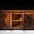 Handcrafted in Italy from solid walnut, this sideboard features walnut and mahogany veneers arranged to showcase the...