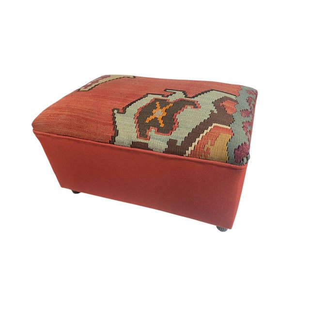 This custom-made ottoman features a vintage handmade tribal Turkish kilim on the seat, paired with orange cotton fabric on...