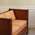 A two-piece upholstered sofa in mahogany, created around the mid-19th century within the Biedermeier style, with rolled...
