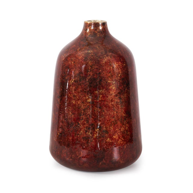 A striking combination of gold and crimson. The crimson hues resemble flowing lava, infusing the collection with dynamic...