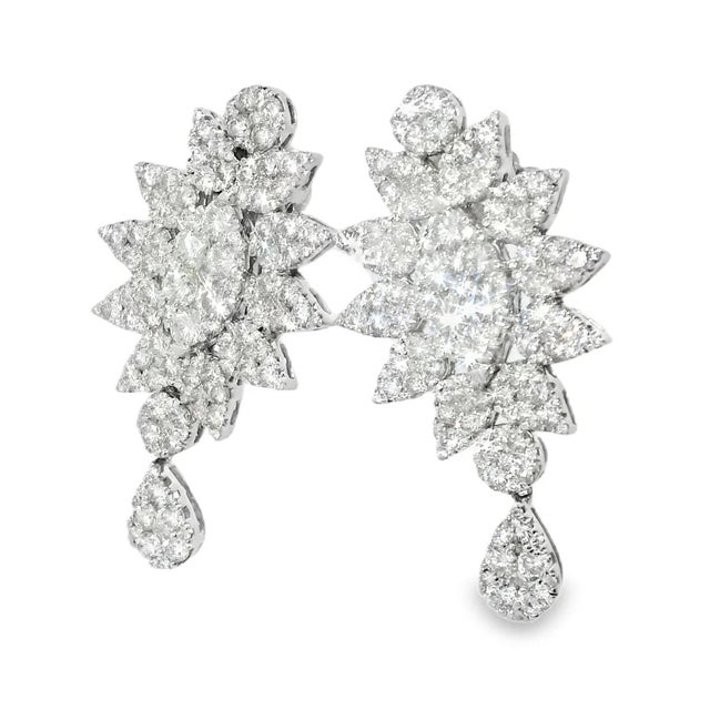 Magnificent 18K White Gold Diamond Drop Earrings. Metal: 18K White Gold Gemstones: Numerous Brilliant Round Diamonds -...