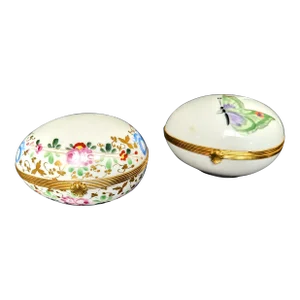 Early 20th Century Butterfly and Floral Limoges Egg Shaped Boxes, a Pair